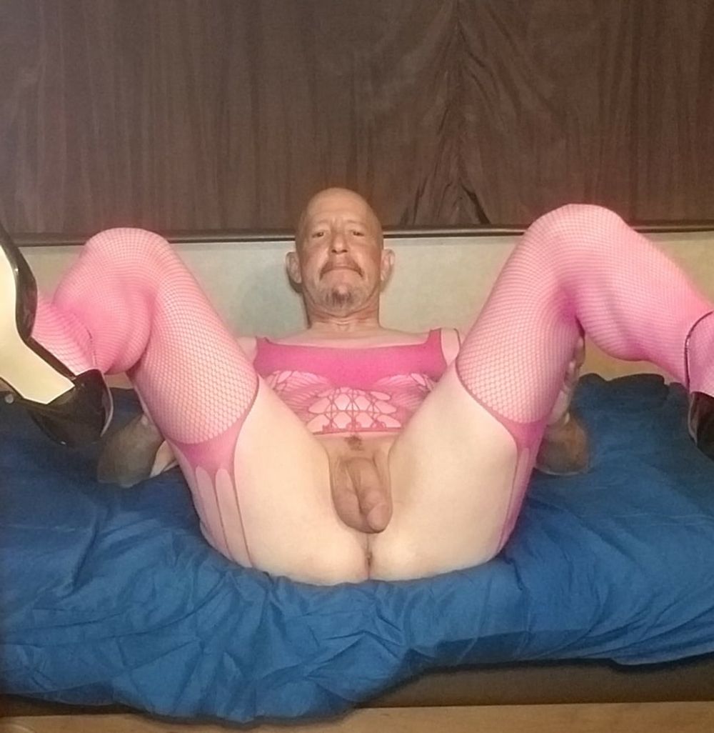 Faggot Andrew Brown in Pink Fishnet and Heels