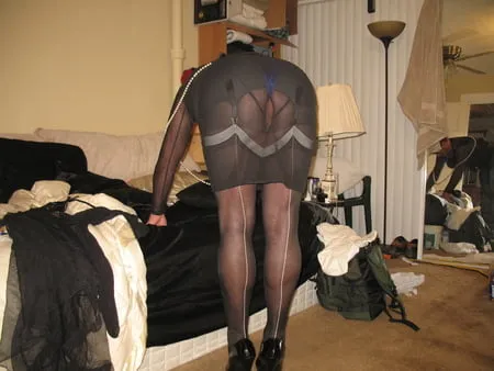 long luscious legs encased in sheer black silk ff nylons         