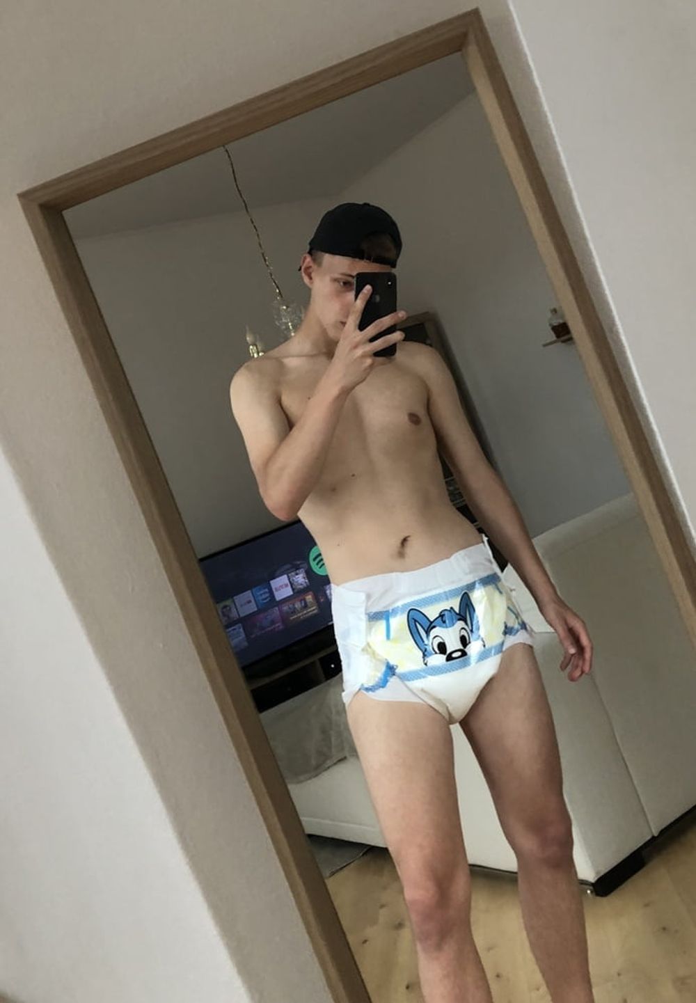 Padded boy wears abu diaper