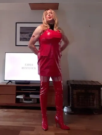 sissy in red lingerie and thigh boots         