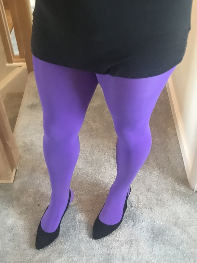 Wearing Purple tights pantyhose