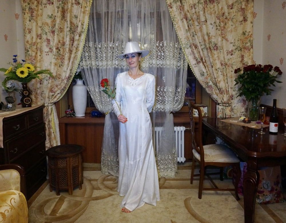 In Wedding Dress and White Hat #26