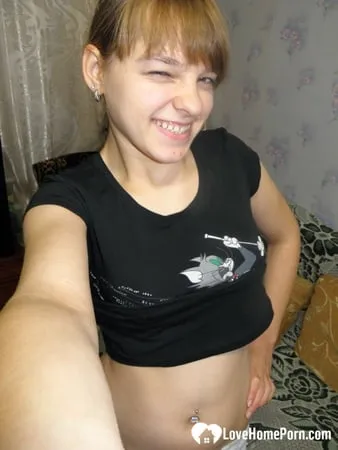 petite teen slowly strips off her clothes         