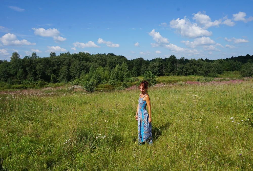 In blue dress in field #17