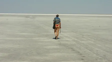 lying naked on the salt of the saltlake elton russia         