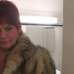 Secretly filmed in a fur coat