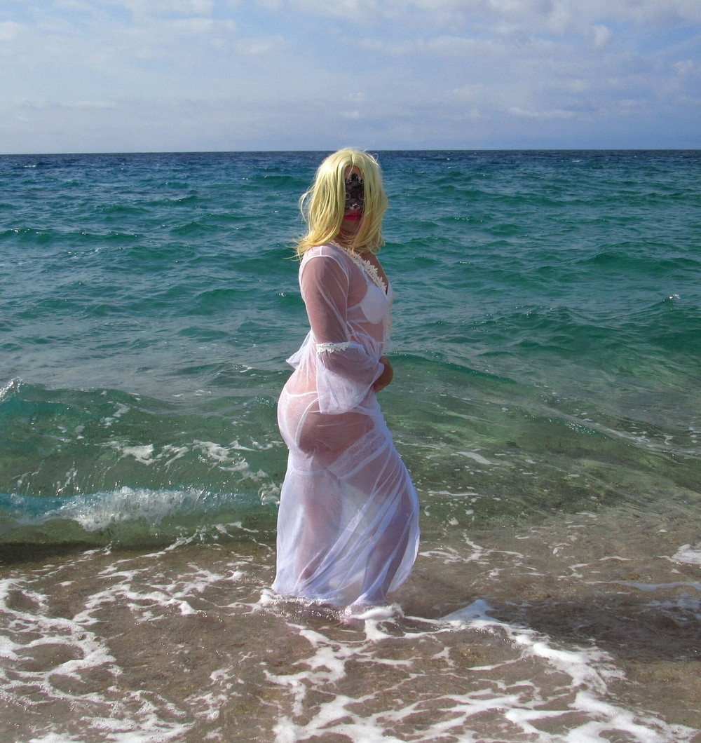 Sexy MILF Blonde shows off her ass on the beach. #42
