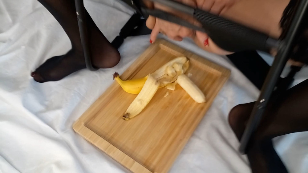 A close-up of a banana in my pussy. #12