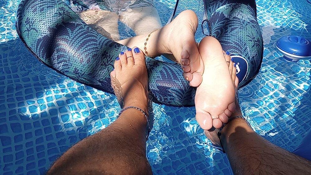 Our feet in the pool #10