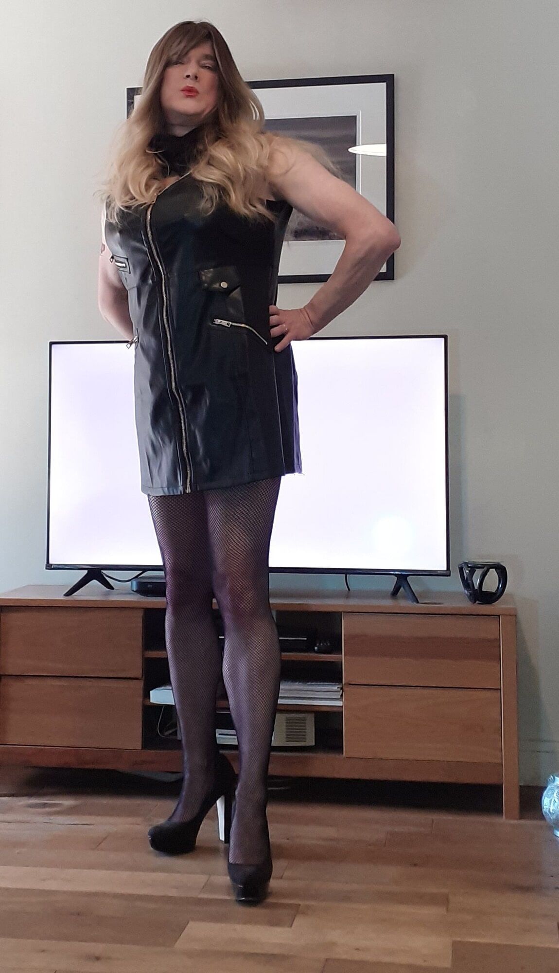 crossdressed in black leather dress #3