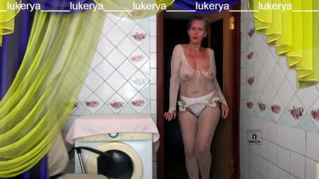 old body of sexy lukerya in white fishnet with visible nippl         