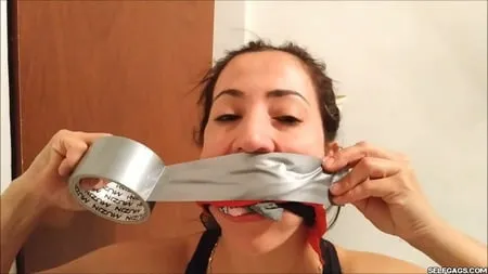 self gagged latina mom with a mouthful of socks selfgags         