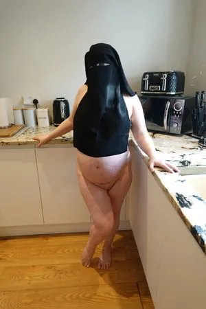 pregnant wife in muslim niqab and nursing bra         