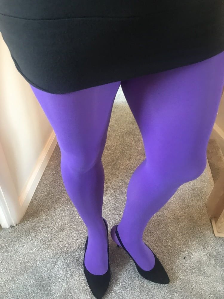 Wearing Purple tights pantyhose