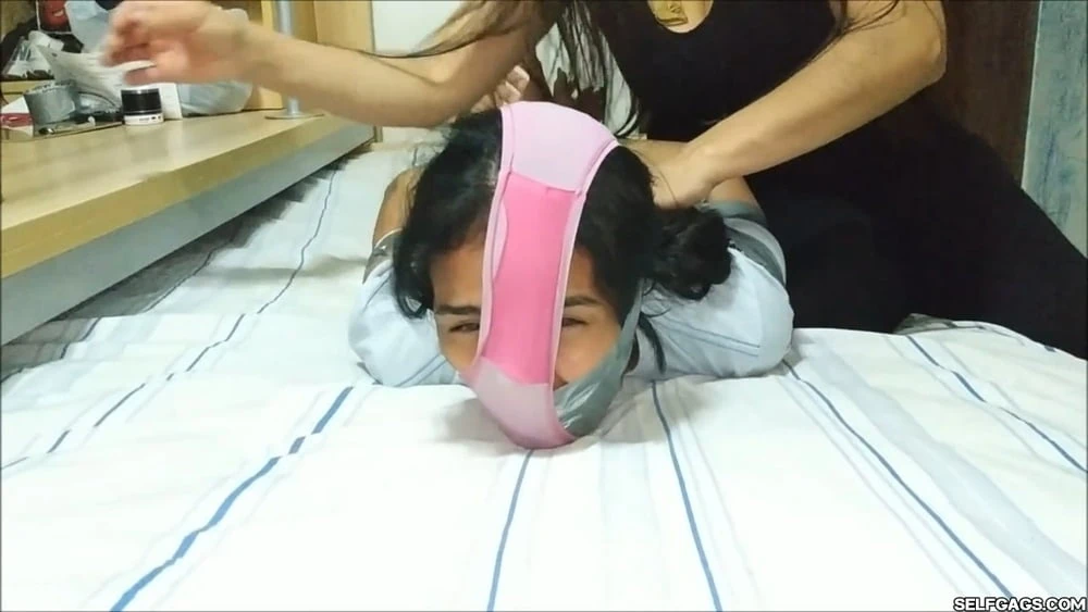 Panty Hooded Girl Gagged With Socks And Tape #25