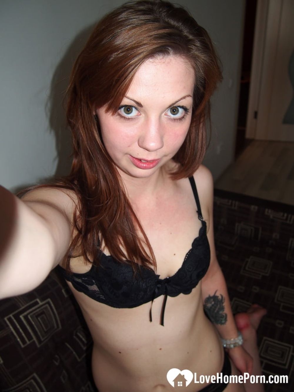 Naughty redhead babe loves teasing the camera