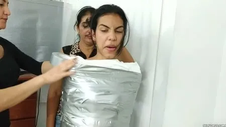 heavily duct tape mummified by crazy bondage women         