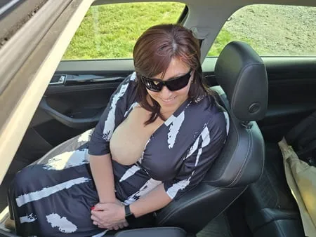 beatiful busty milf in car         