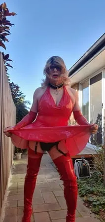 rachel wears red pvc dress         