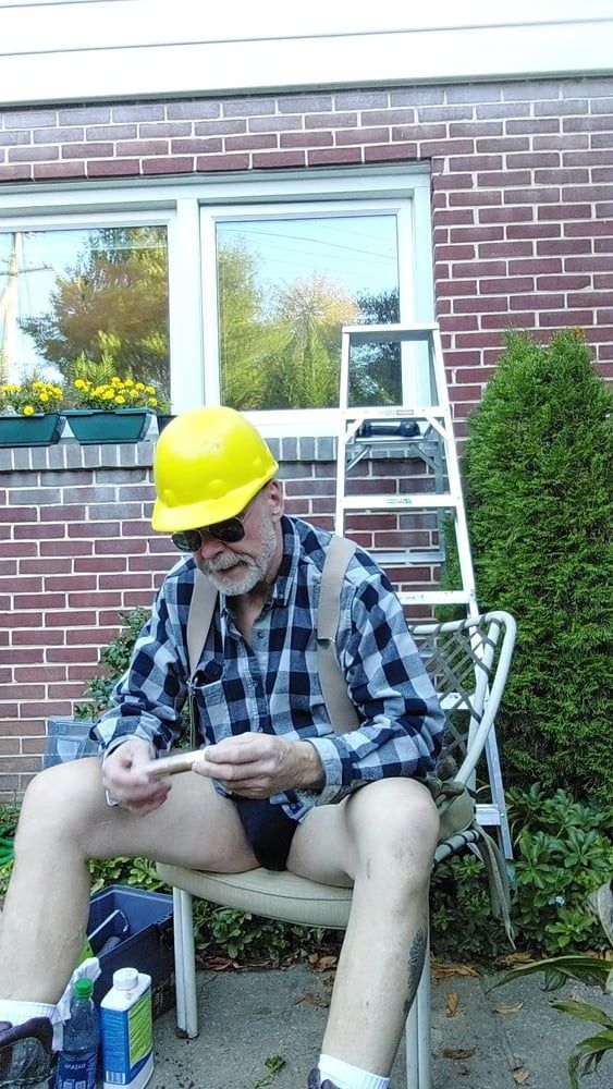 Construction dad inspecting windows #12