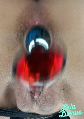 a stunning shoot with my ruby red butt plug         