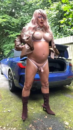 amateur crossdresser kellycd     sexy milf in brown pvc mac         