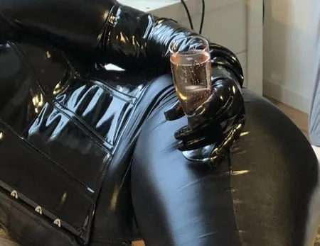 black catsuit boots corset and vibrator         