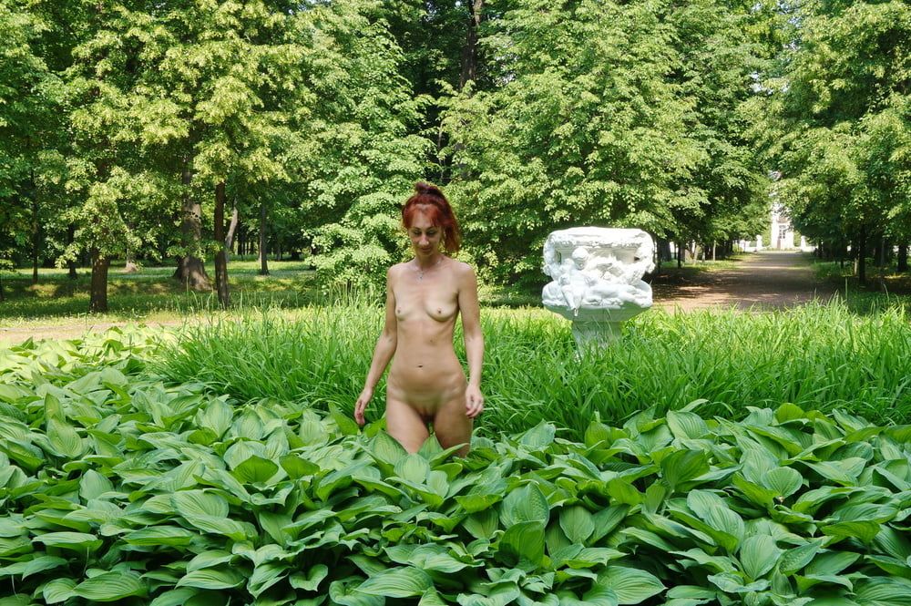 Naked in the grass by the vase #4