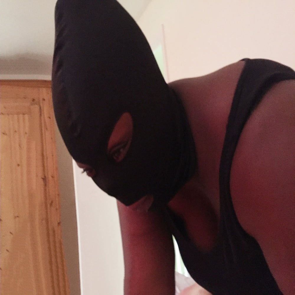 Cheating Masked Ebony with white lovers cock