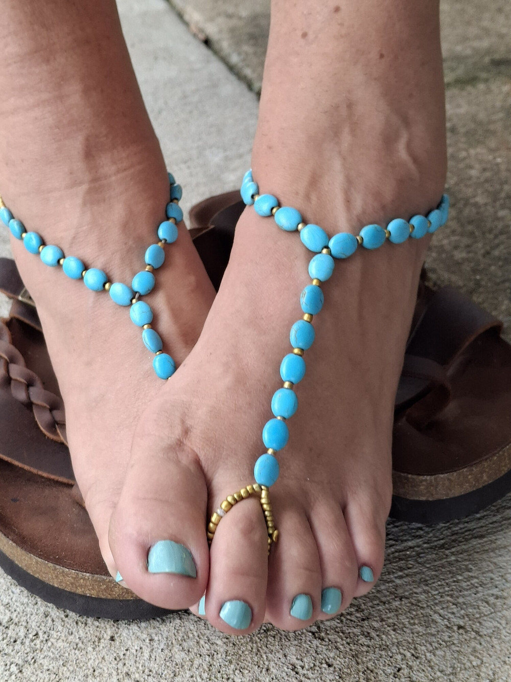 Cute feet wearing barefoot sandals #5