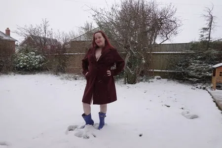 pregnant flashing naked in the cold snow         