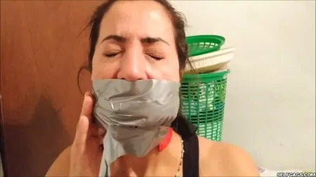 self gagged latina mom with a mouthful of socks selfgags         