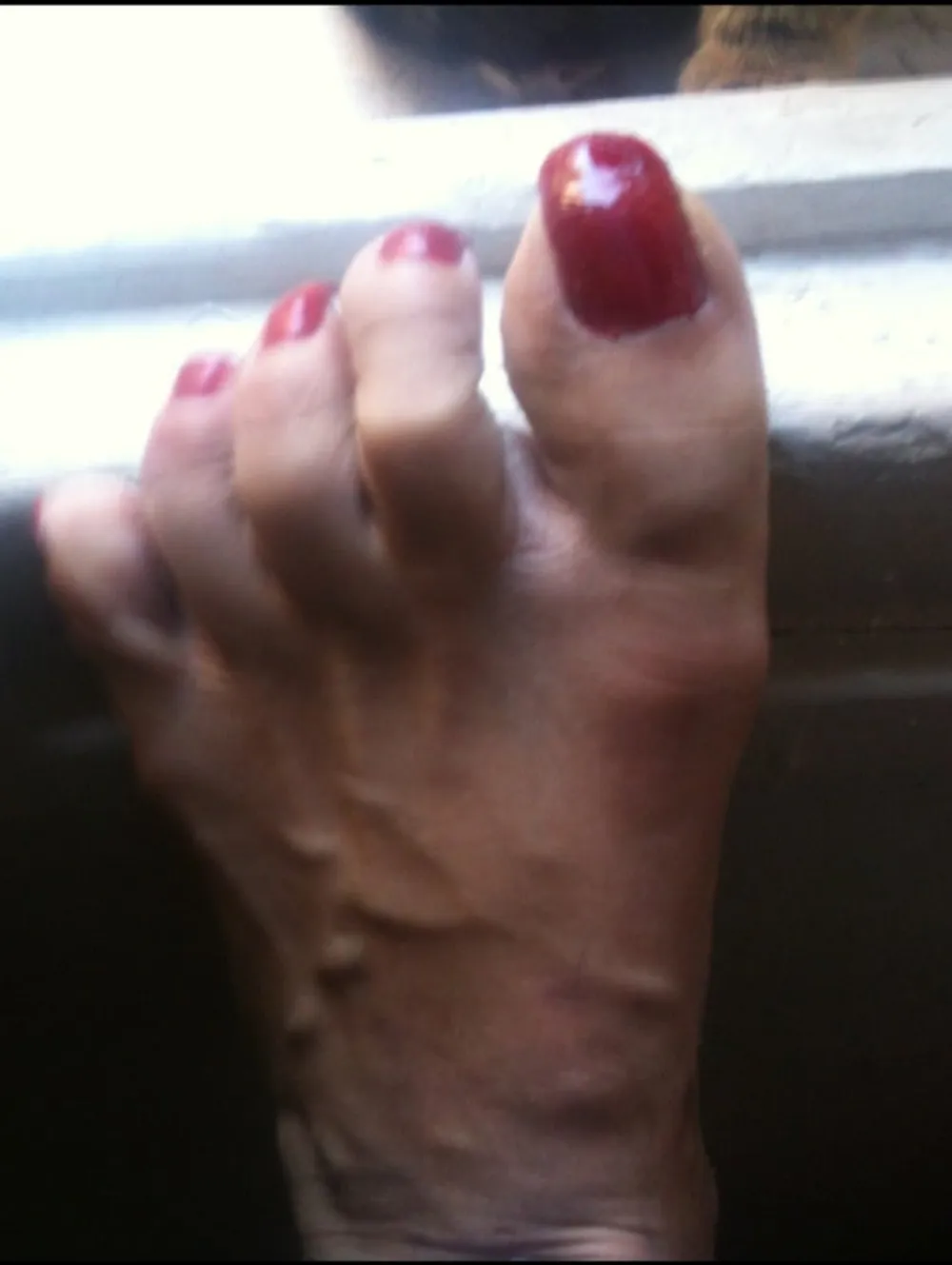 red toenails mix (older, dirty, toe ring, sandals mixed). #4