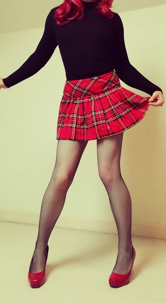 Marie crossdresser in fishnet pantyhose and tartan skirt #37