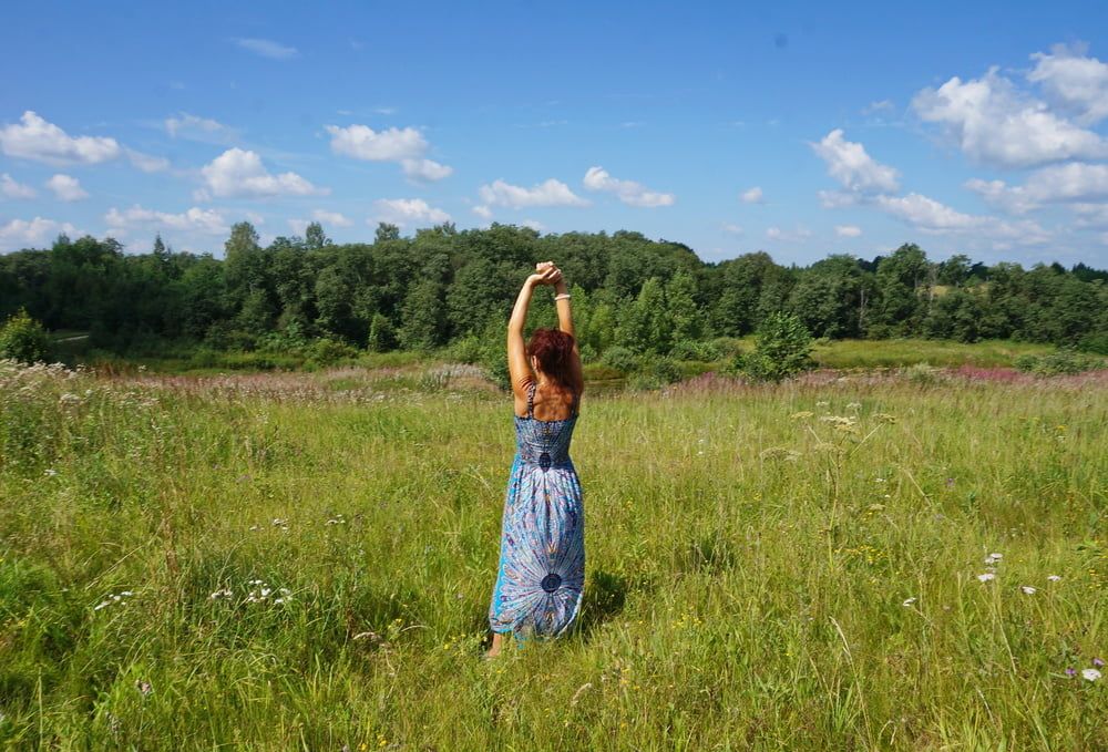 In blue dress in field #21