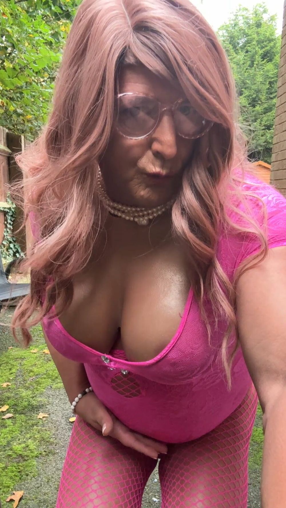 Crossdresser kellycd2022 in pink playsuit and fishnets  #13