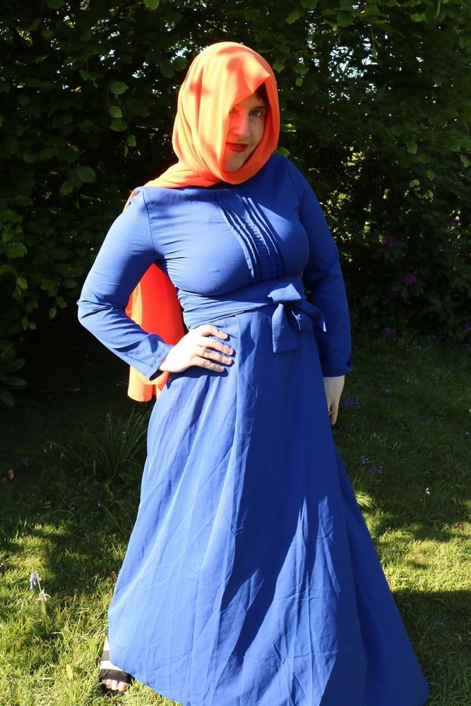 hijab and abaya flashing outdoors #58