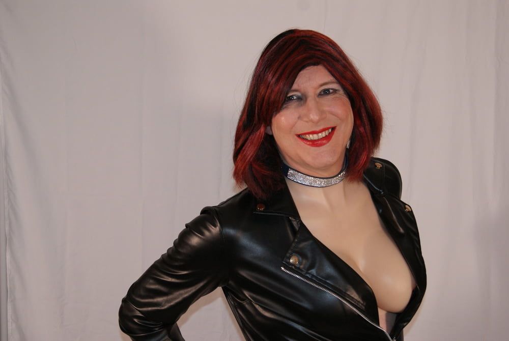 TGirl Lucy being Dom in leather look dress and big tits #45