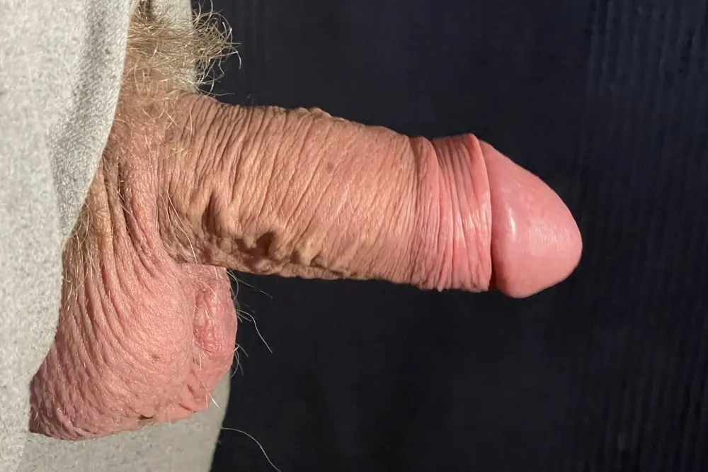 Thick uncut Russian cock hangs out of zipper