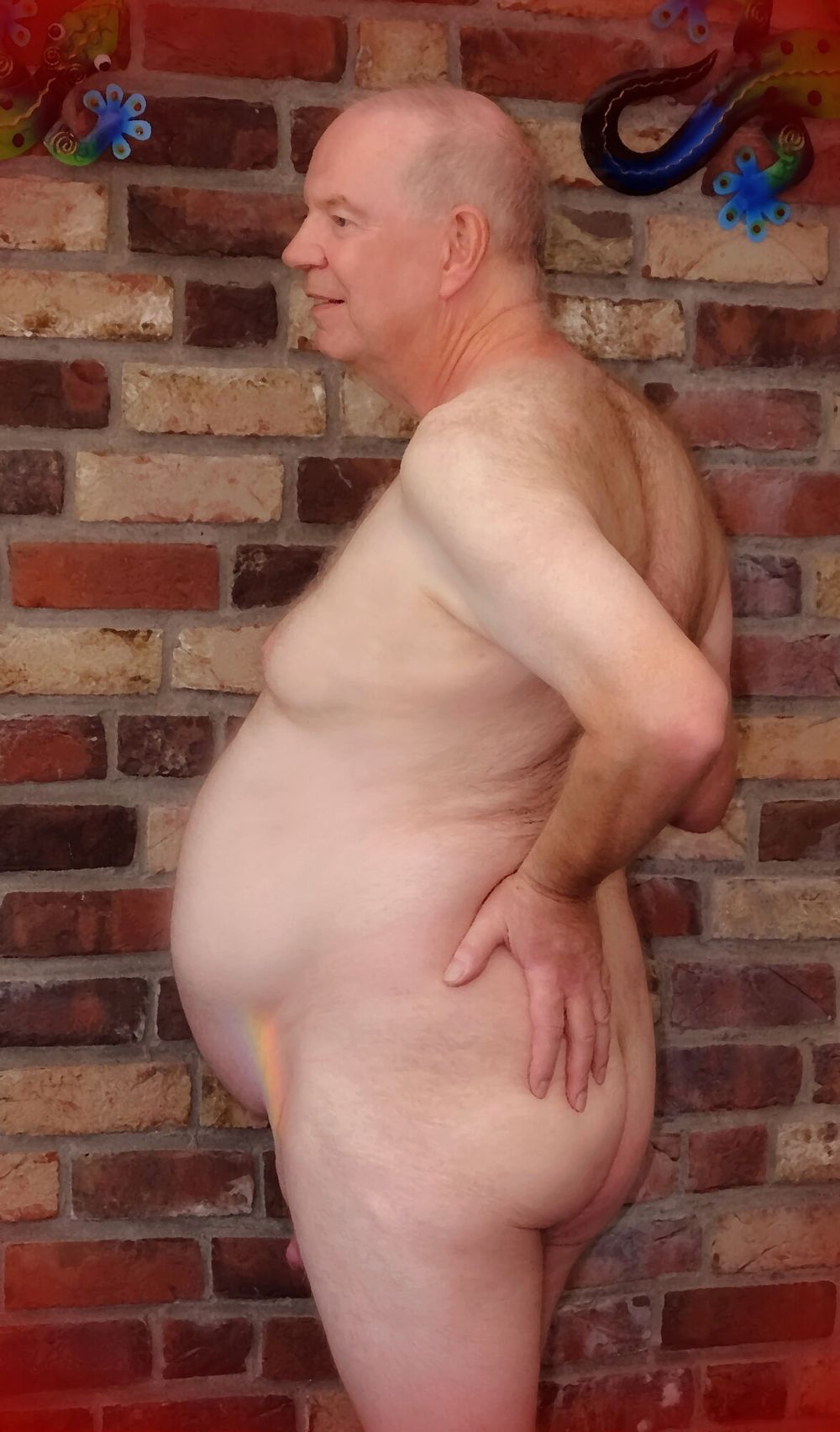 Fat Daddy Nick poses casually from a wall #4