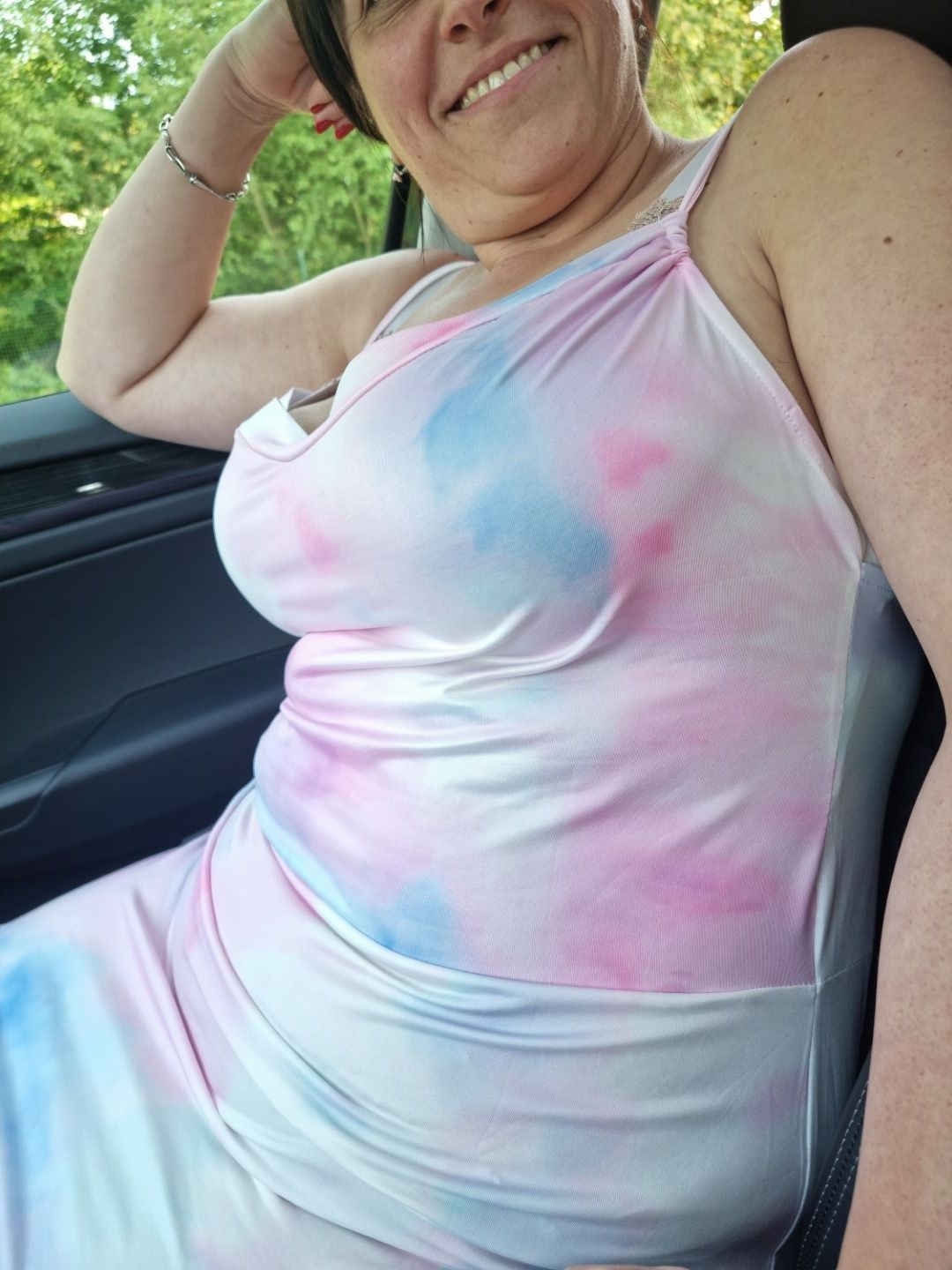 Busty milf showing her huge tits in car #3