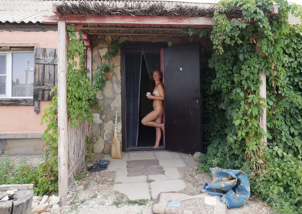 Nude on porch #28