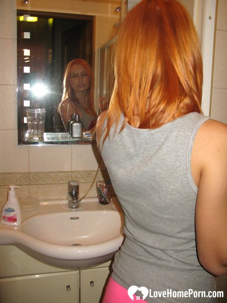 Redhead taking some hot selfies before showering #15
