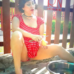 Retro maid prepares potatoes for dinner. Vintage performance
