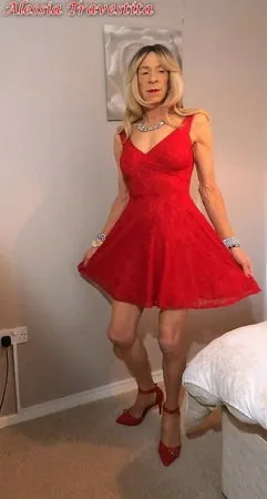    alessia travestita in flirty red dress         