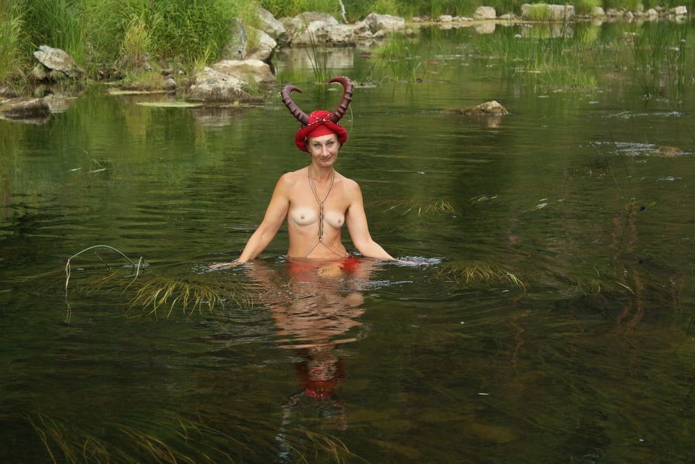 With Horns In Red Dress In Shallow River #54