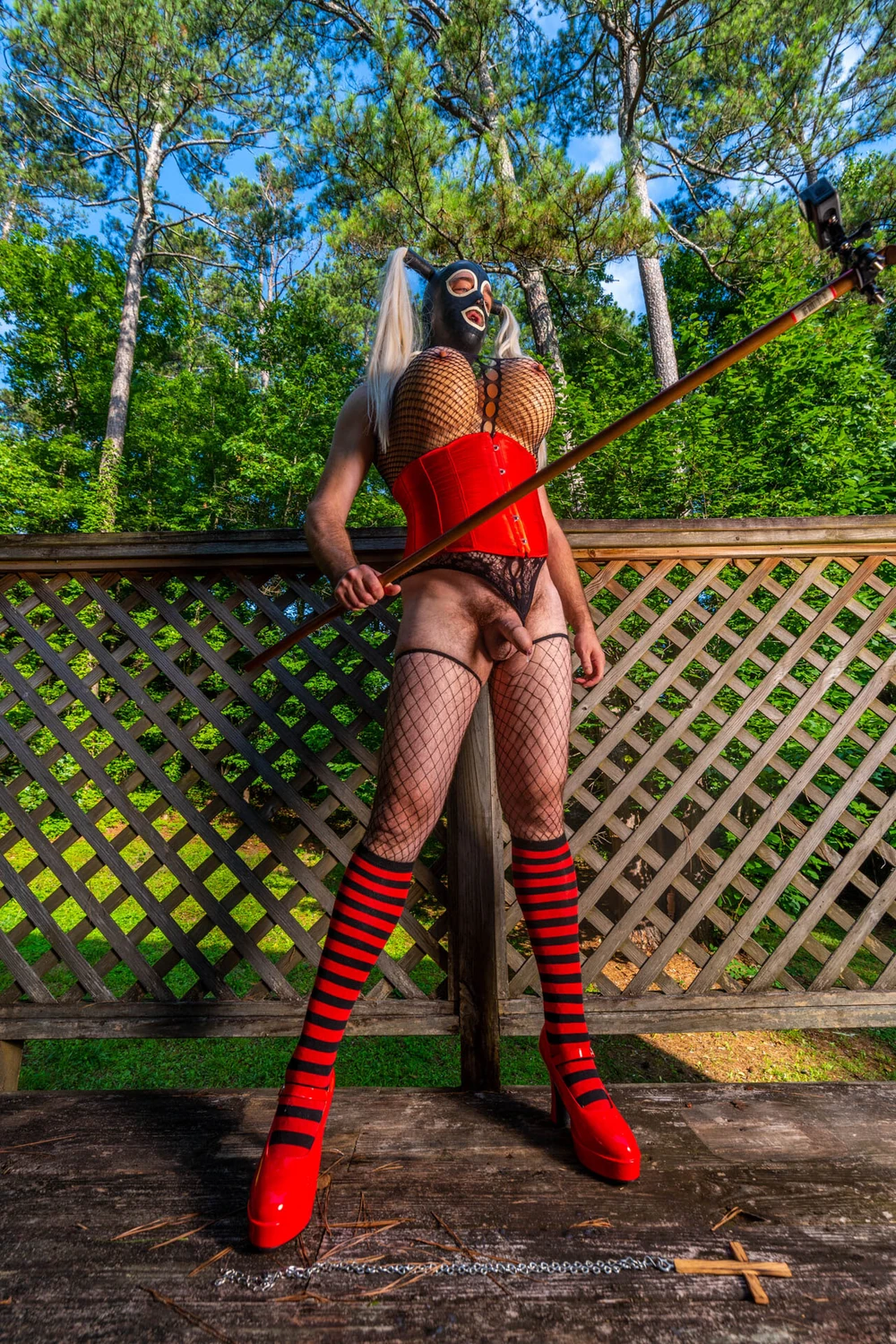 Giant fake tits corseted crossdresser in heels