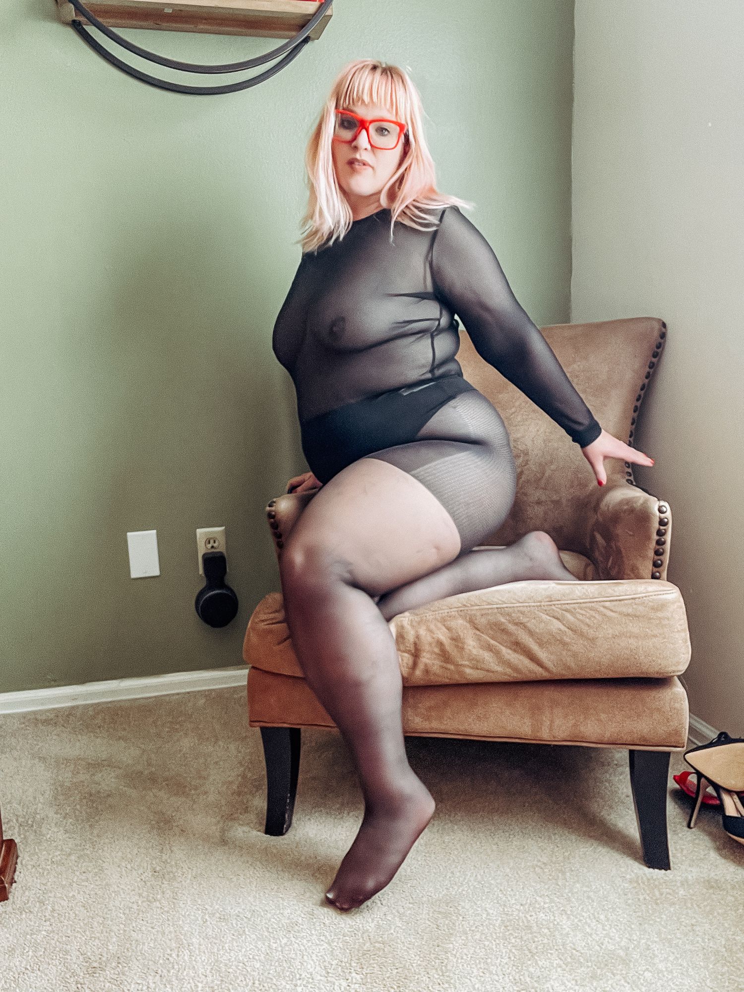 Gorgeous BBW in a black body suit see through Lace Sheer