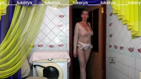 old body of sexy lukerya in white fishnet with visible nippl         