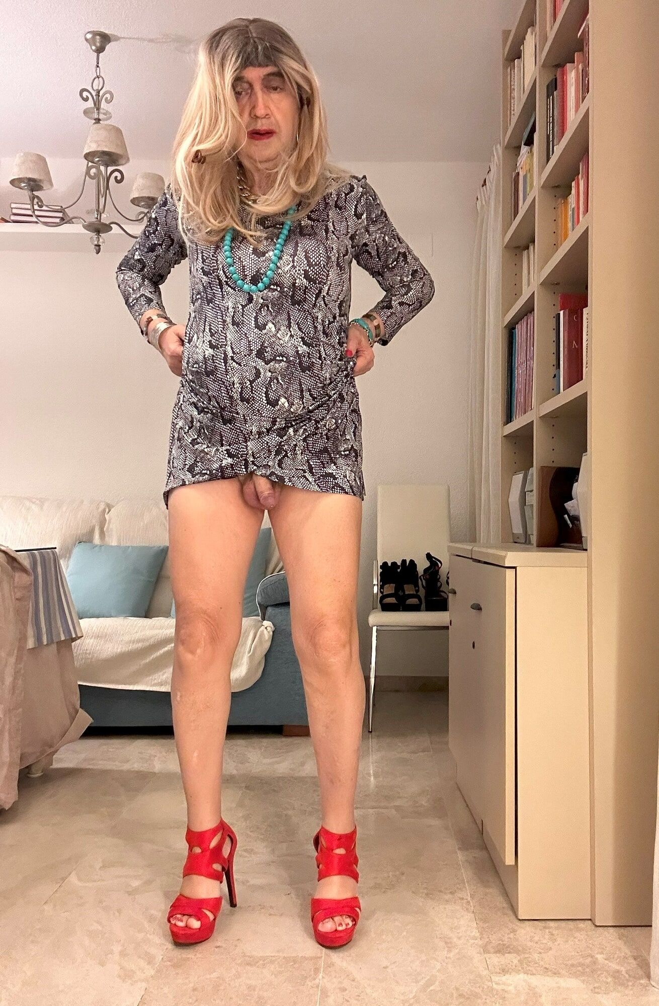 Daniela Monroe Spanish TV, snake dress, red high heels #8